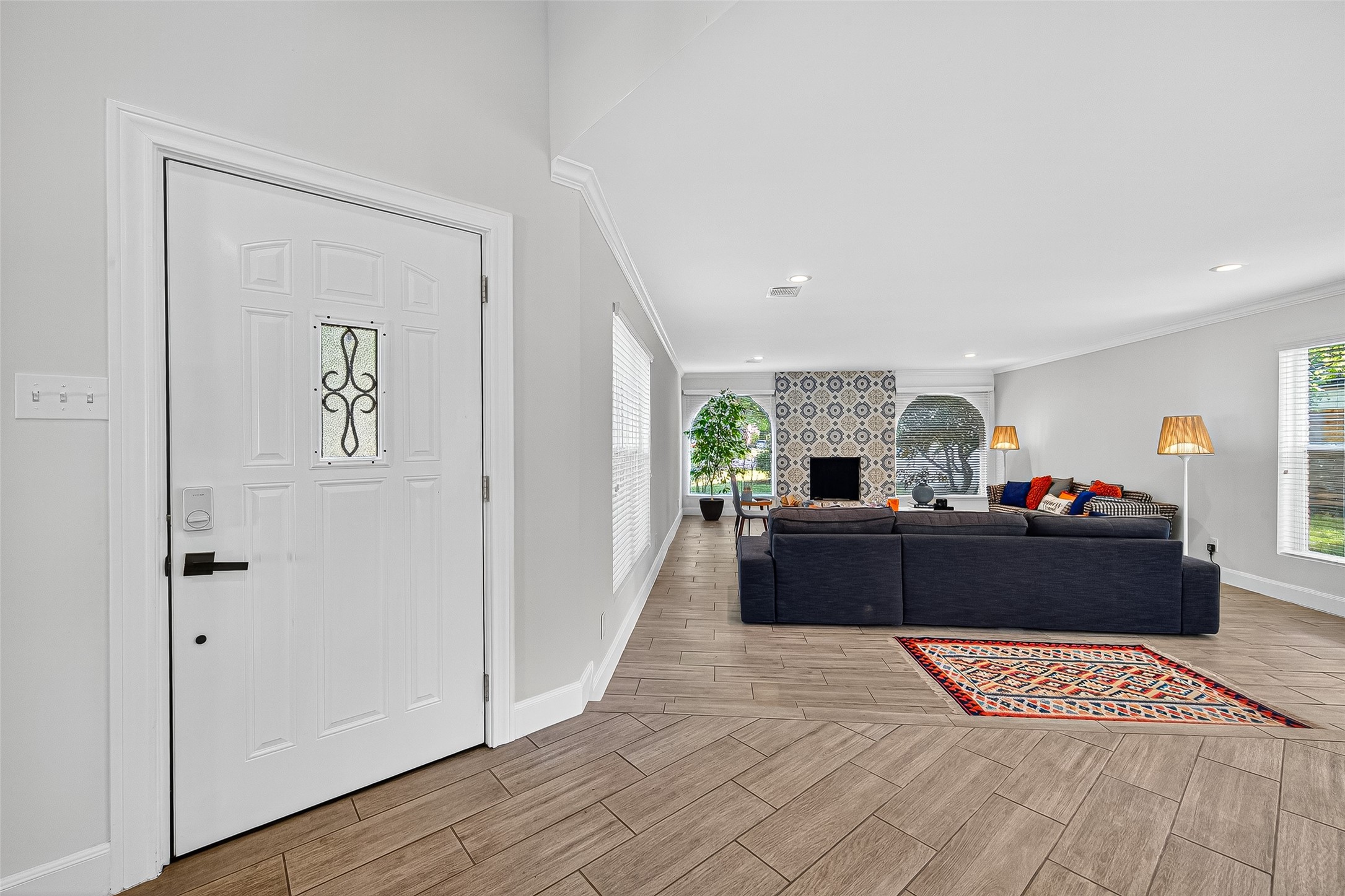818 Silvergate Drive Houston, TX 77079 - Photo 4 of 40 a living room with furniture and a fireplace