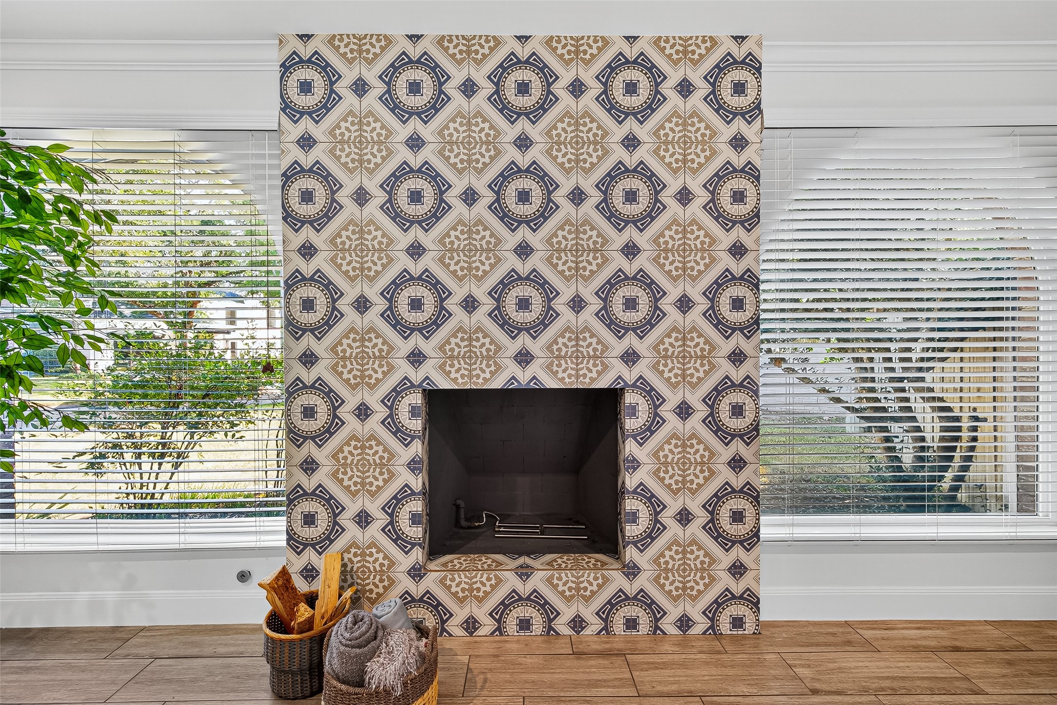 818 Silvergate Drive Houston, TX 77079 - Photo 7 of 40 a living room with a fireplace and a flat screen tv