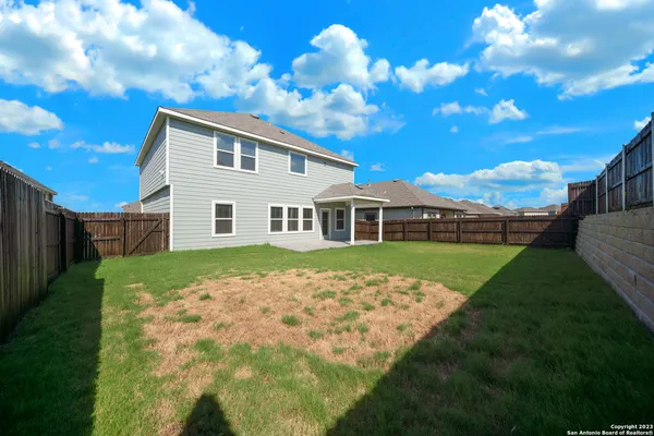 a view of house with garden