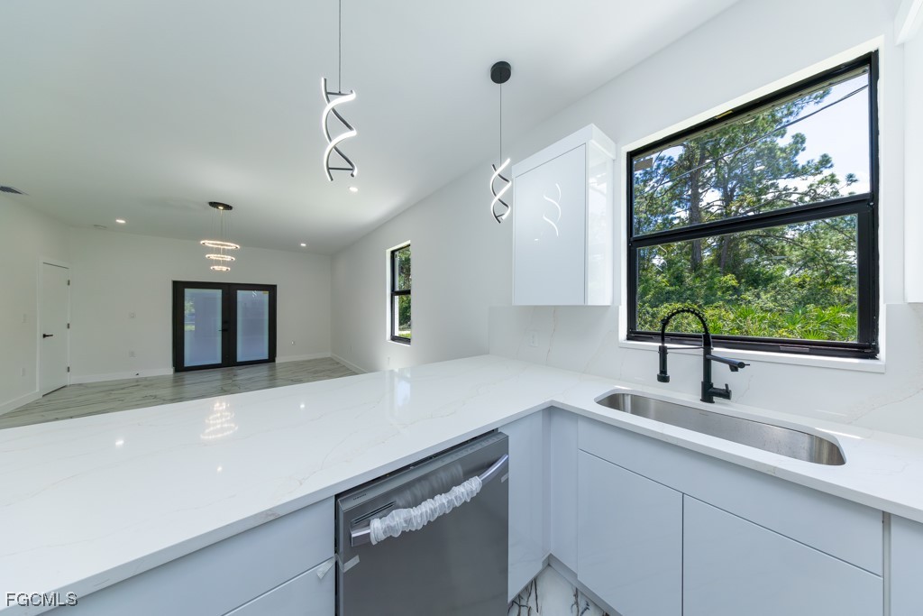 2006 Truman Avenue Alva, FL 33920 - Photo 11 of 45 a kitchen with a sink and large window