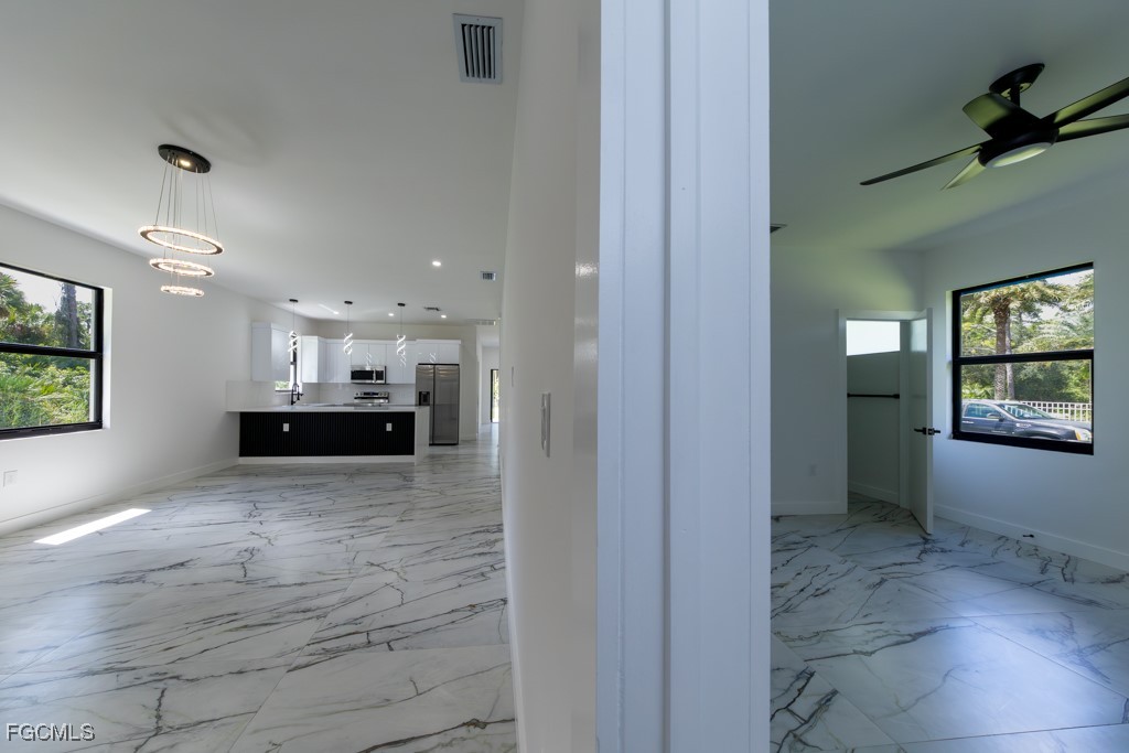 2006 Truman Avenue Alva, FL 33920 - Photo 26 of 45 a view of kitchen and kitchen with furniture