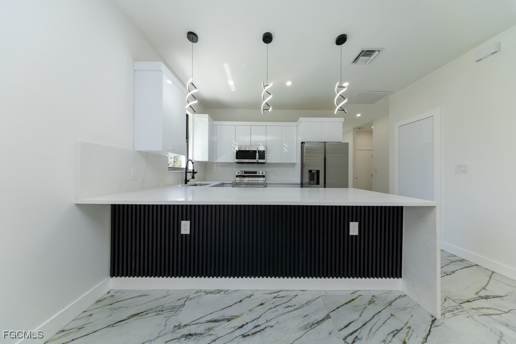 2006 Truman Avenue Alva, FL 33920 - Photo 6 of 45 a view of kitchen with refrigerator and window