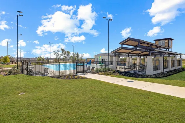 a view of a house with a swimming pool