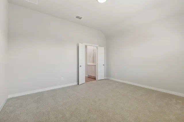 a view of an empty room and window