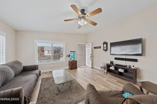 a kitchen with stainless steel appliances granite countertop a sink a stove top oven a counter space and cabinets