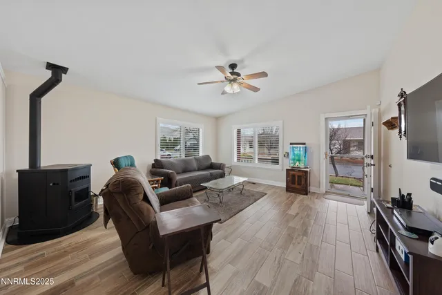 a kitchen with stainless steel appliances granite countertop a stove sink microwave and cabinets