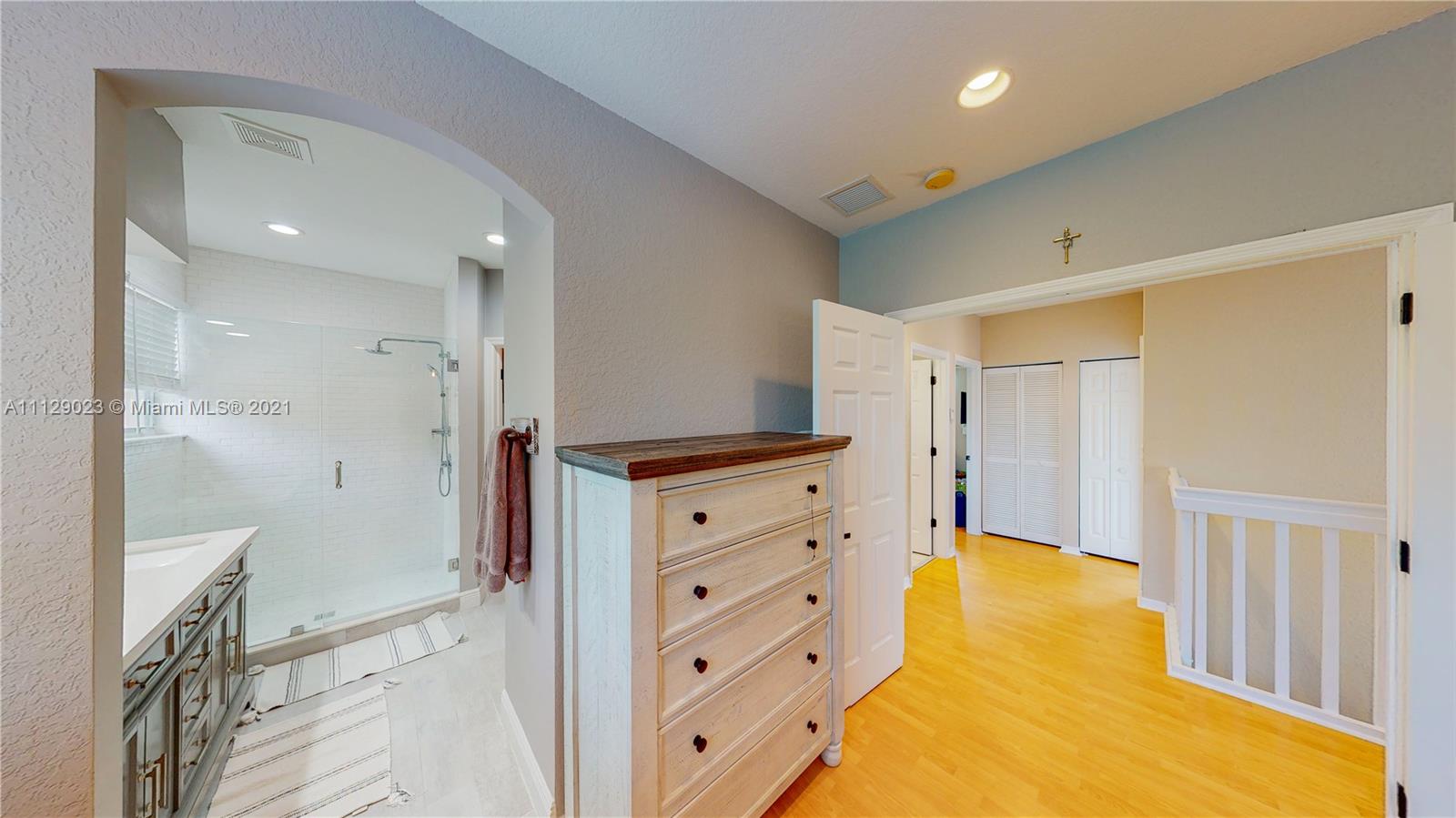 1399 Southeast 20th Road Homestead, FL 33035 - Photo 15 of 50 a view of walk in closet and bedroom view