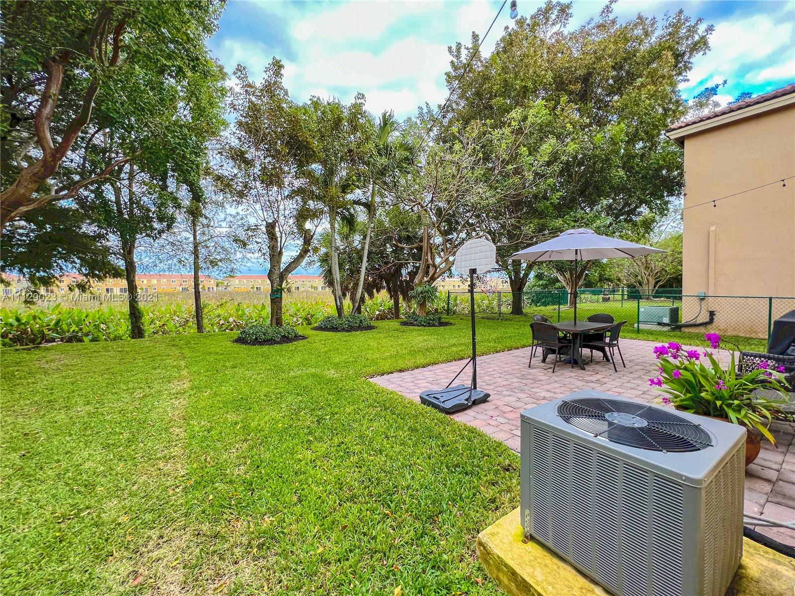 1399 Southeast 20th Road Homestead, FL 33035 - Photo 29 of 50 a view of a backyard with sitting area