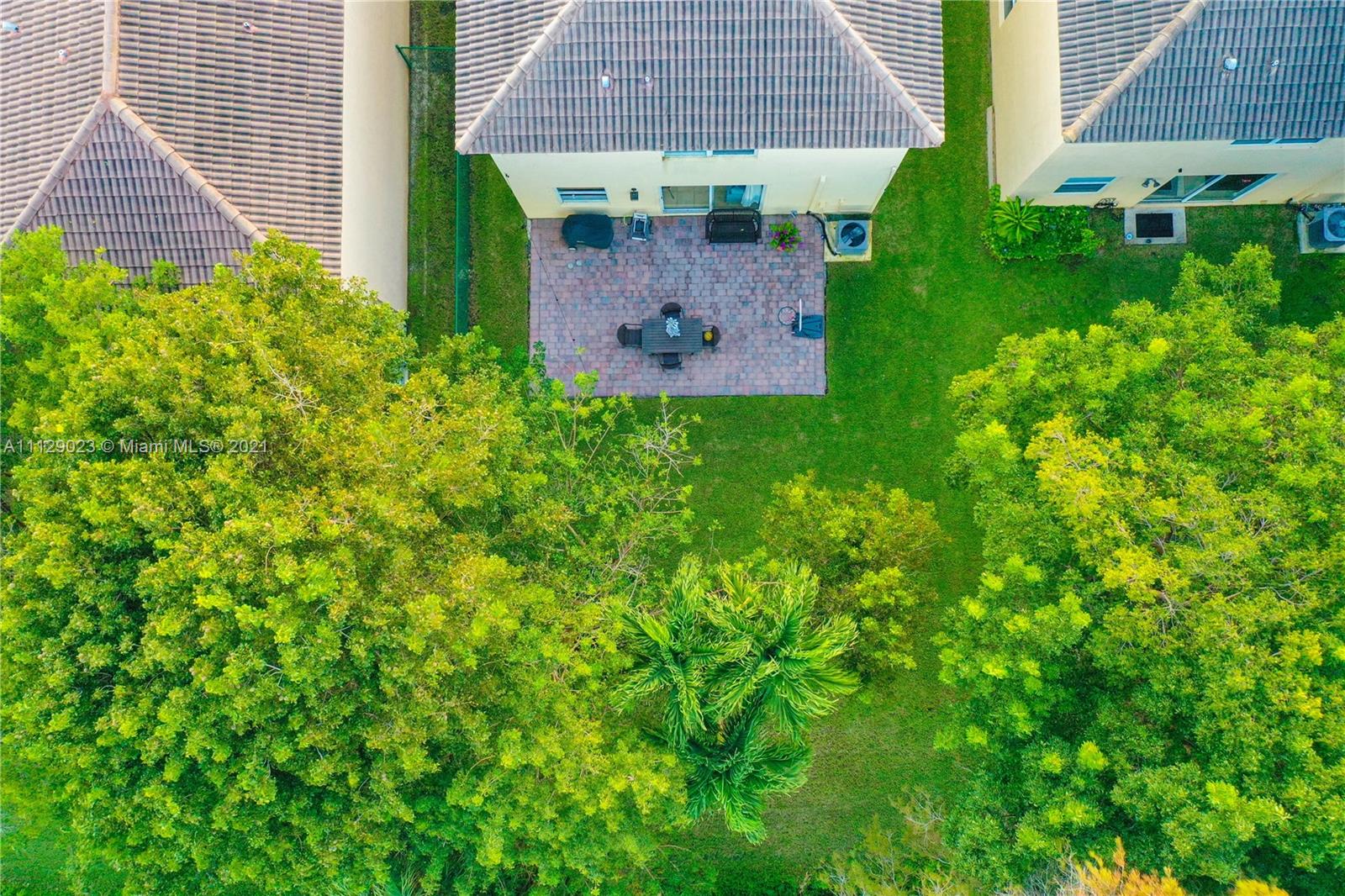 1399 Southeast 20th Road Homestead, FL 33035 - Photo 33 of 50 an aerial view of a house with a garden
