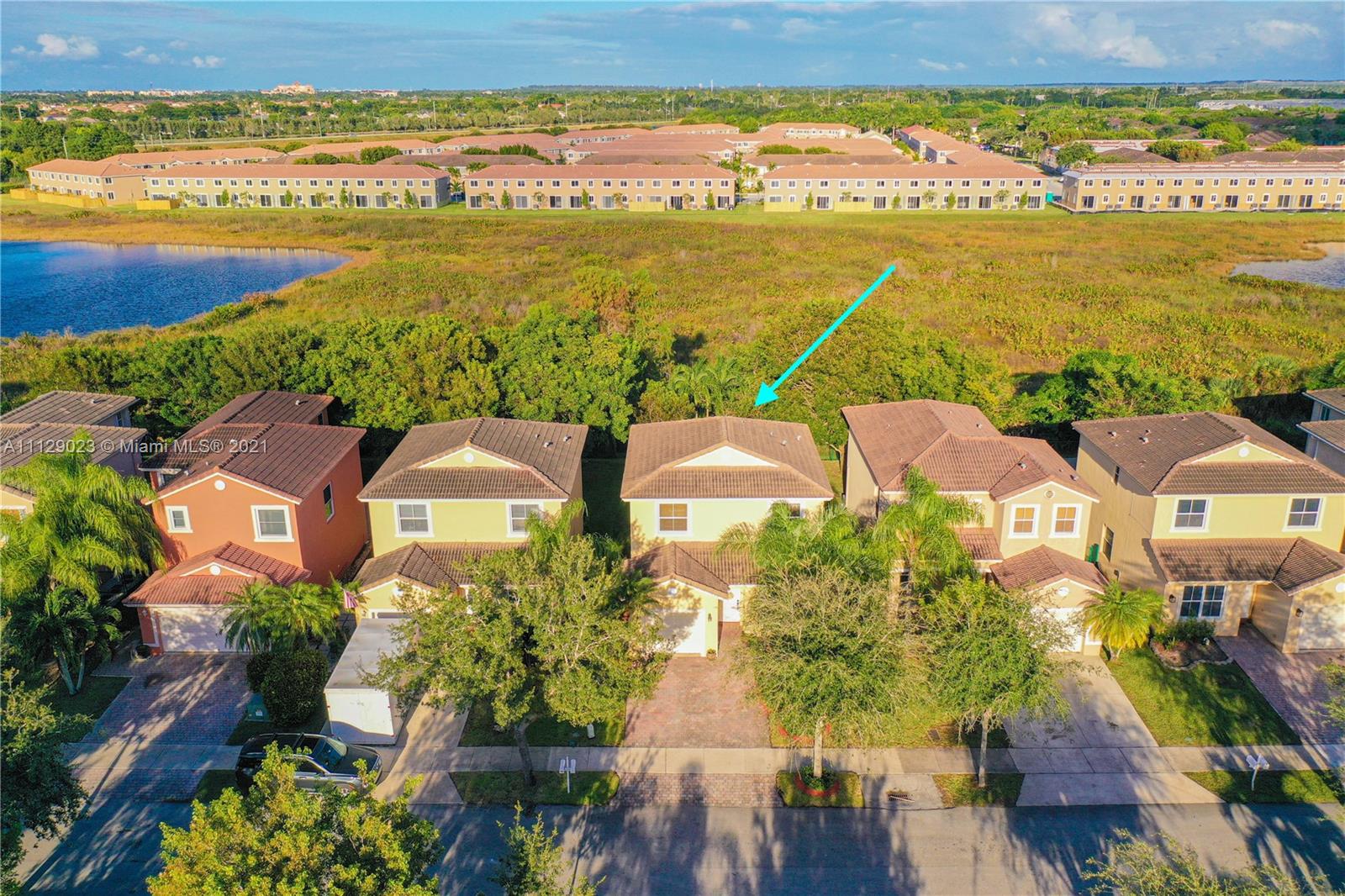 1399 Southeast 20th Road Homestead, FL 33035 - Photo 37 of 50 a view of a city with an ocean