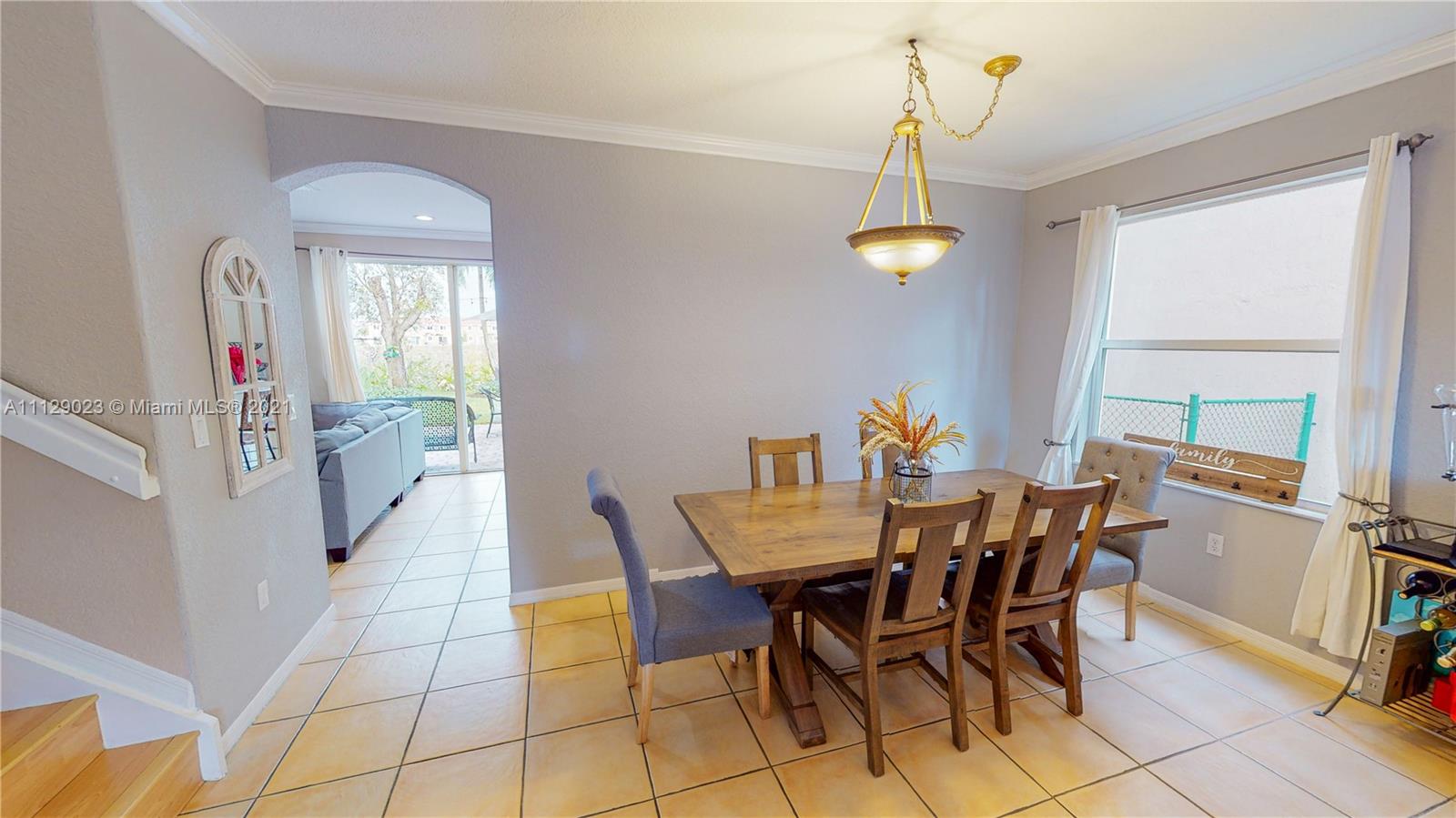 1399 Southeast 20th Road Homestead, FL 33035 - Photo 7 of 50 a dining room with furniture and window