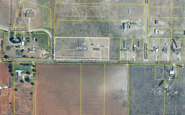 a bathroom with a granite countertop shower and a sink