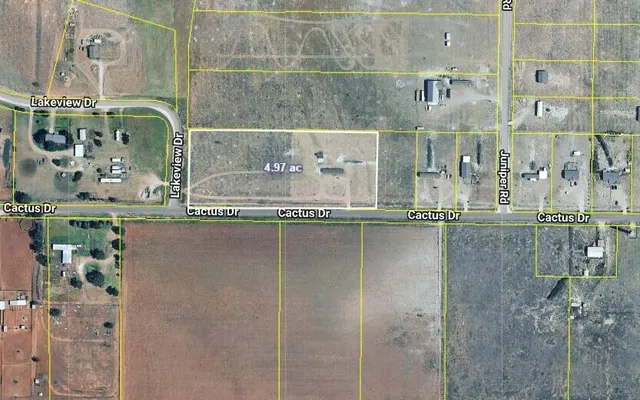 a bathroom with a granite countertop shower and a sink