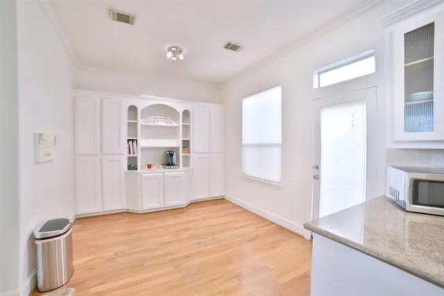 a view of a kitchen cabinets a sink and a dishwasher