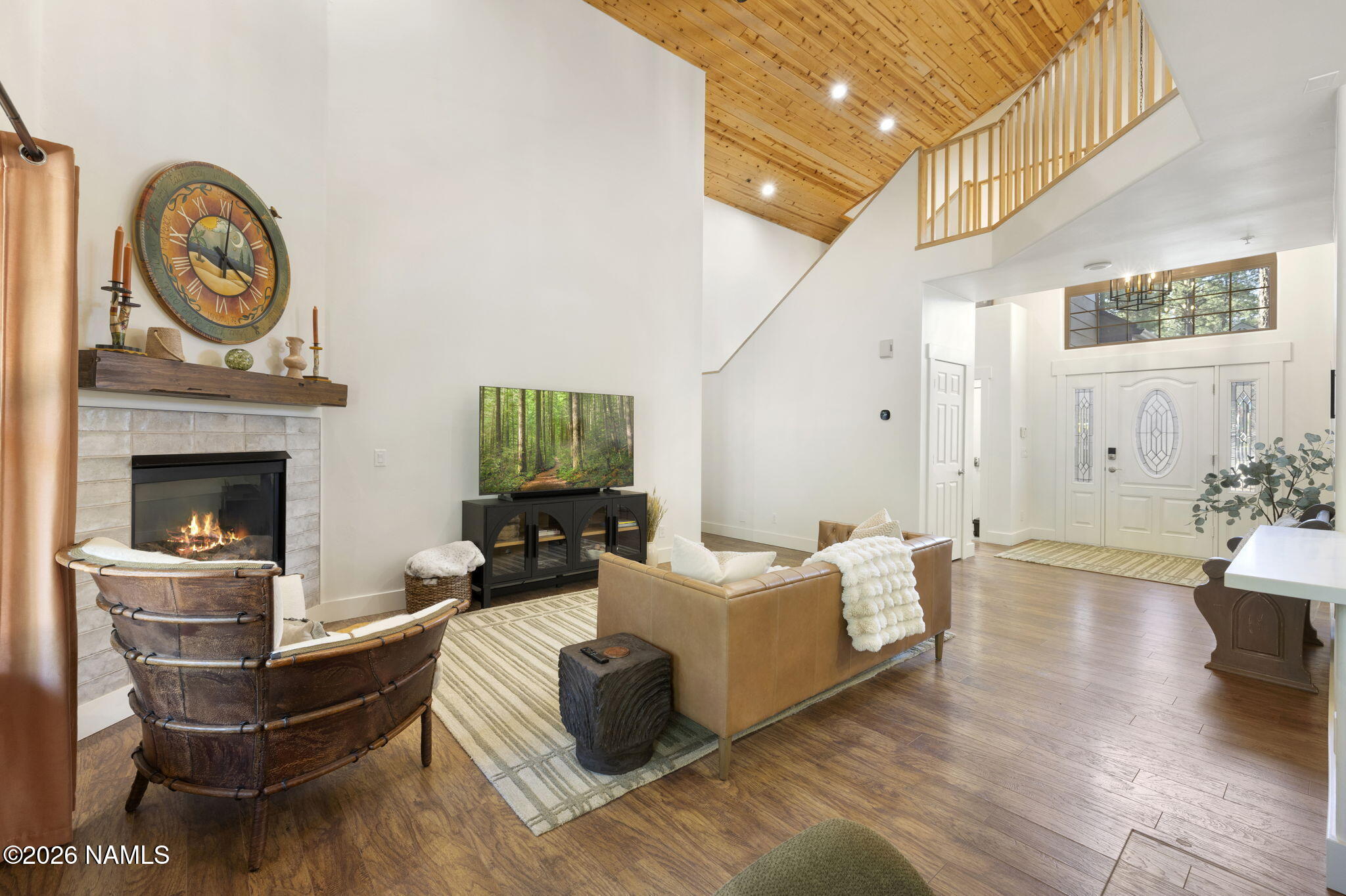 3495 West Lead Rope Flagstaff, AZ 86005 - Photo 14 of 49 a living room with furniture and a fireplace