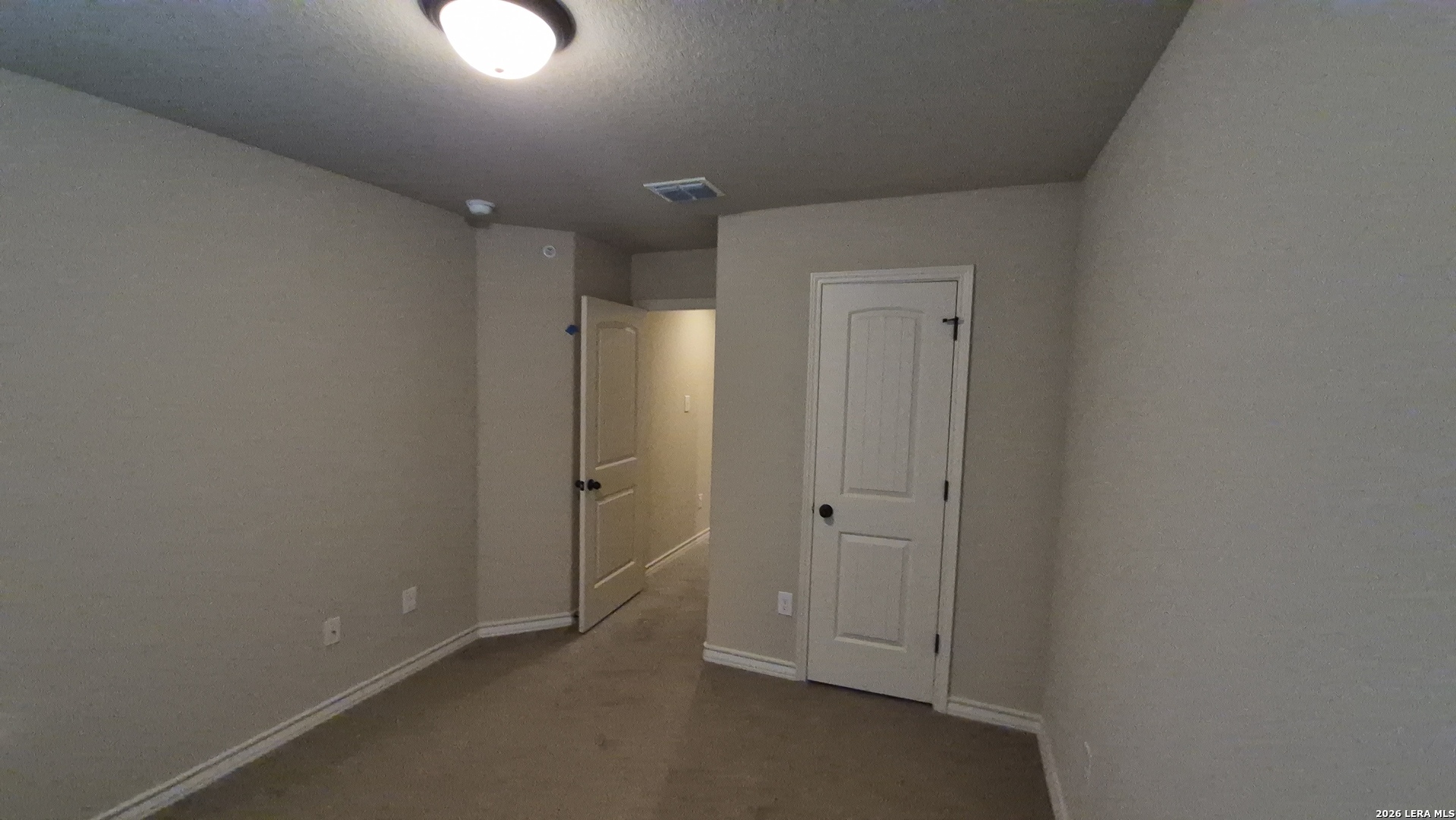 6414 Luglio Lane, Unit 101 San Antonio, TX 78233 - Photo 22 of 23 an empty room with closet area