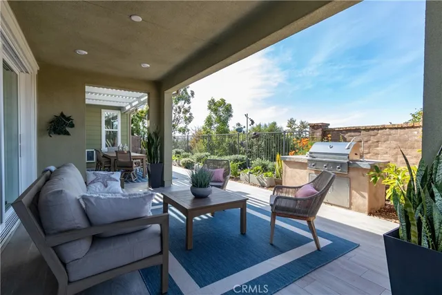 a view of a patio filled with furniture