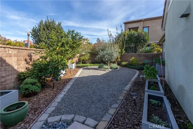 a view of a swimming pool with lounge chairs
