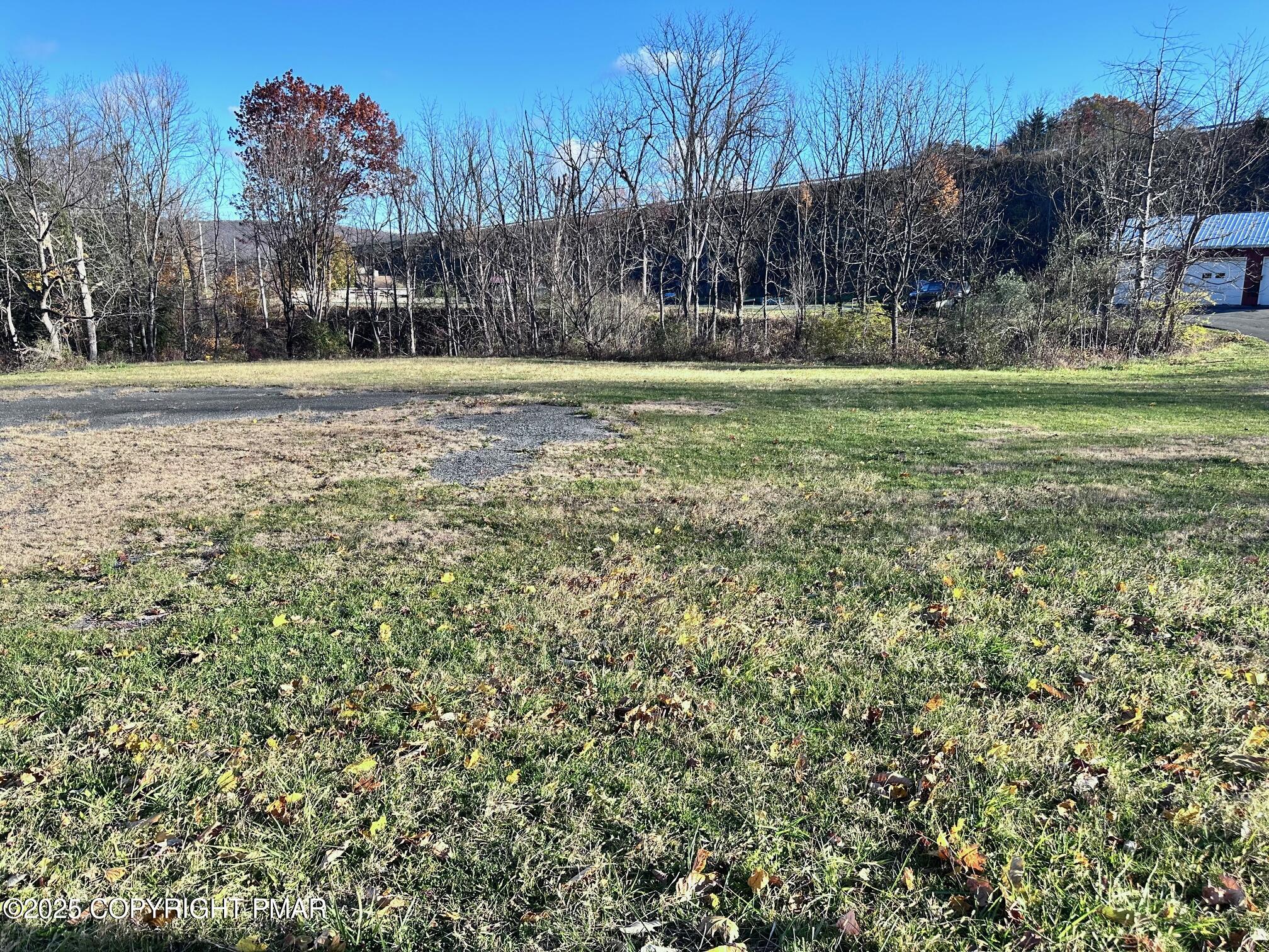 Undisclosed Address Dingmans Ferry, PA 18328 - Photo 17 of 22 a view of outdoor space with trees all around