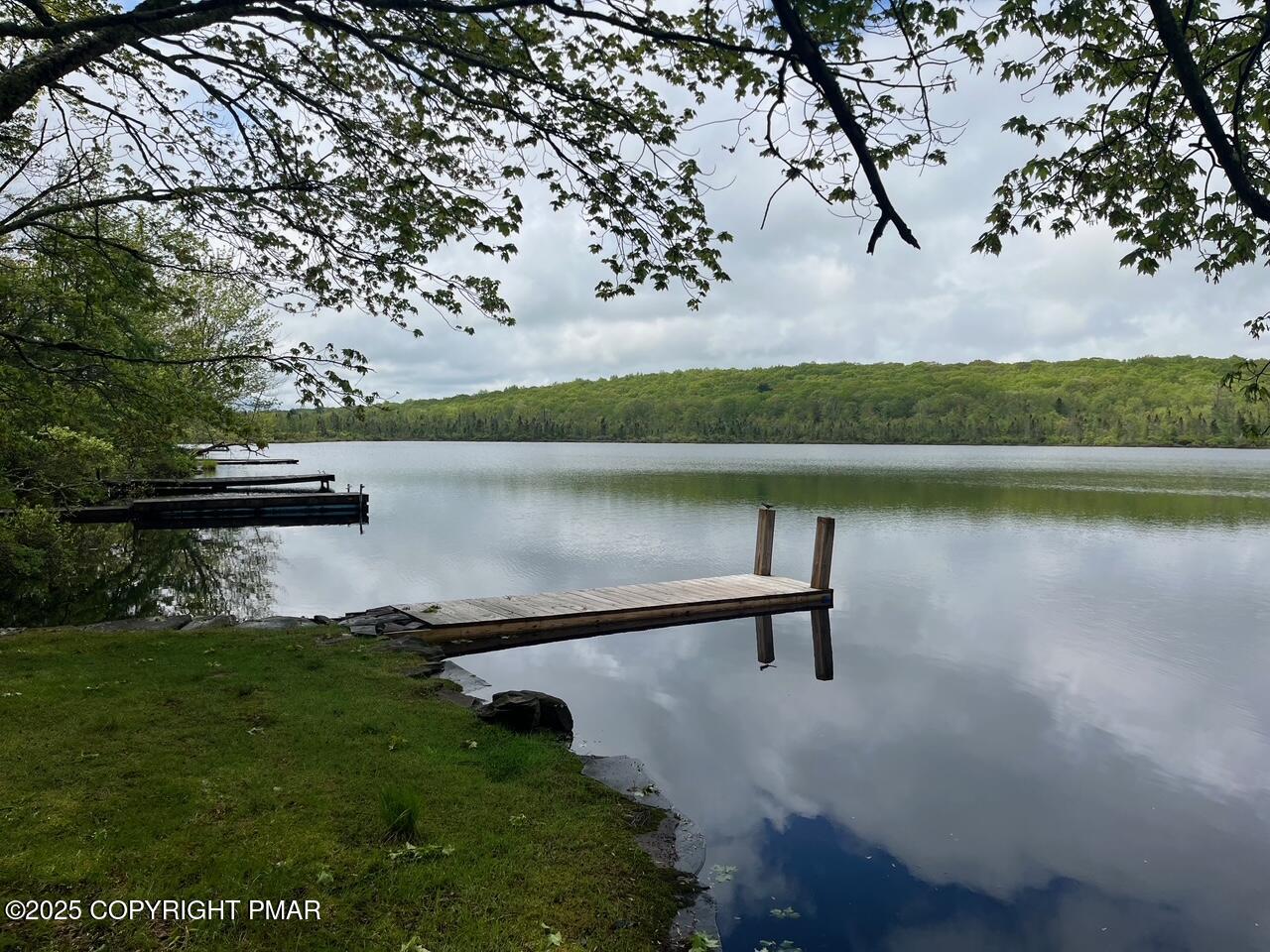 Undisclosed Address Dingmans Ferry, PA 18328 - Photo 18 of 22 a view of a lake in middle of forest