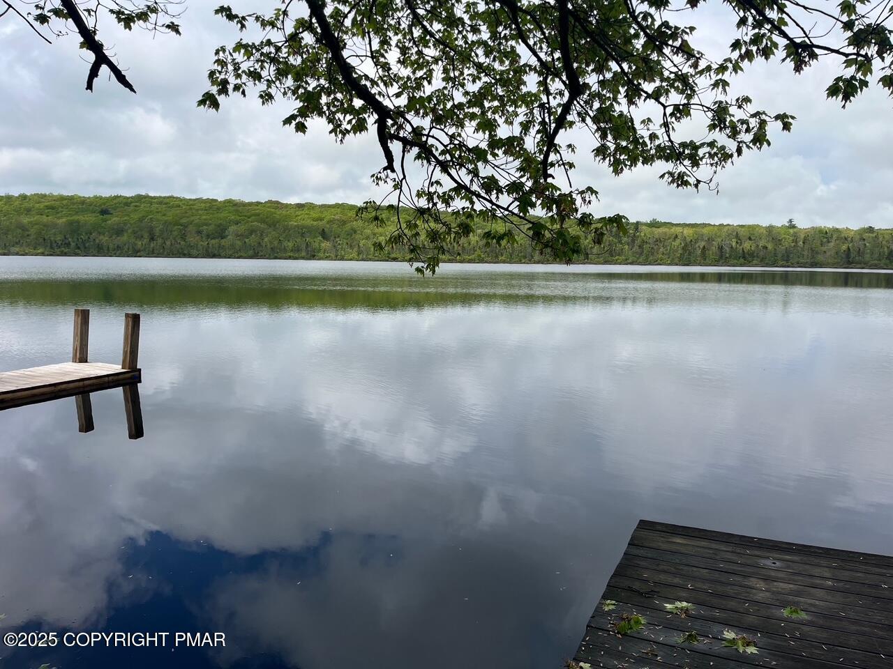 Undisclosed Address Dingmans Ferry, PA 18328 - Photo 19 of 22 a view of a lake