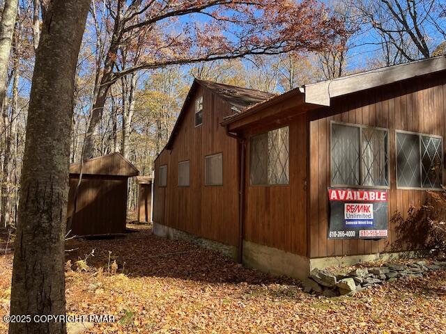 Undisclosed Address Dingmans Ferry, PA 18328 - Photo 3 of 22 a view of a street with an entrance door