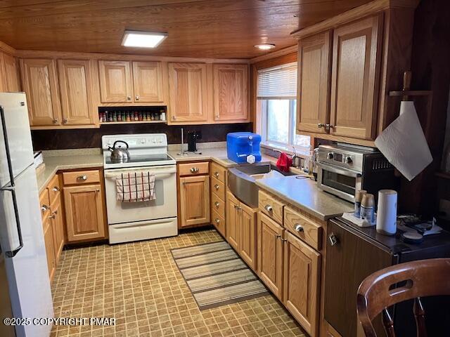 Undisclosed Address Dingmans Ferry, PA 18328 - Photo 4 of 22 a kitchen with stainless steel appliances sink cabinets and window