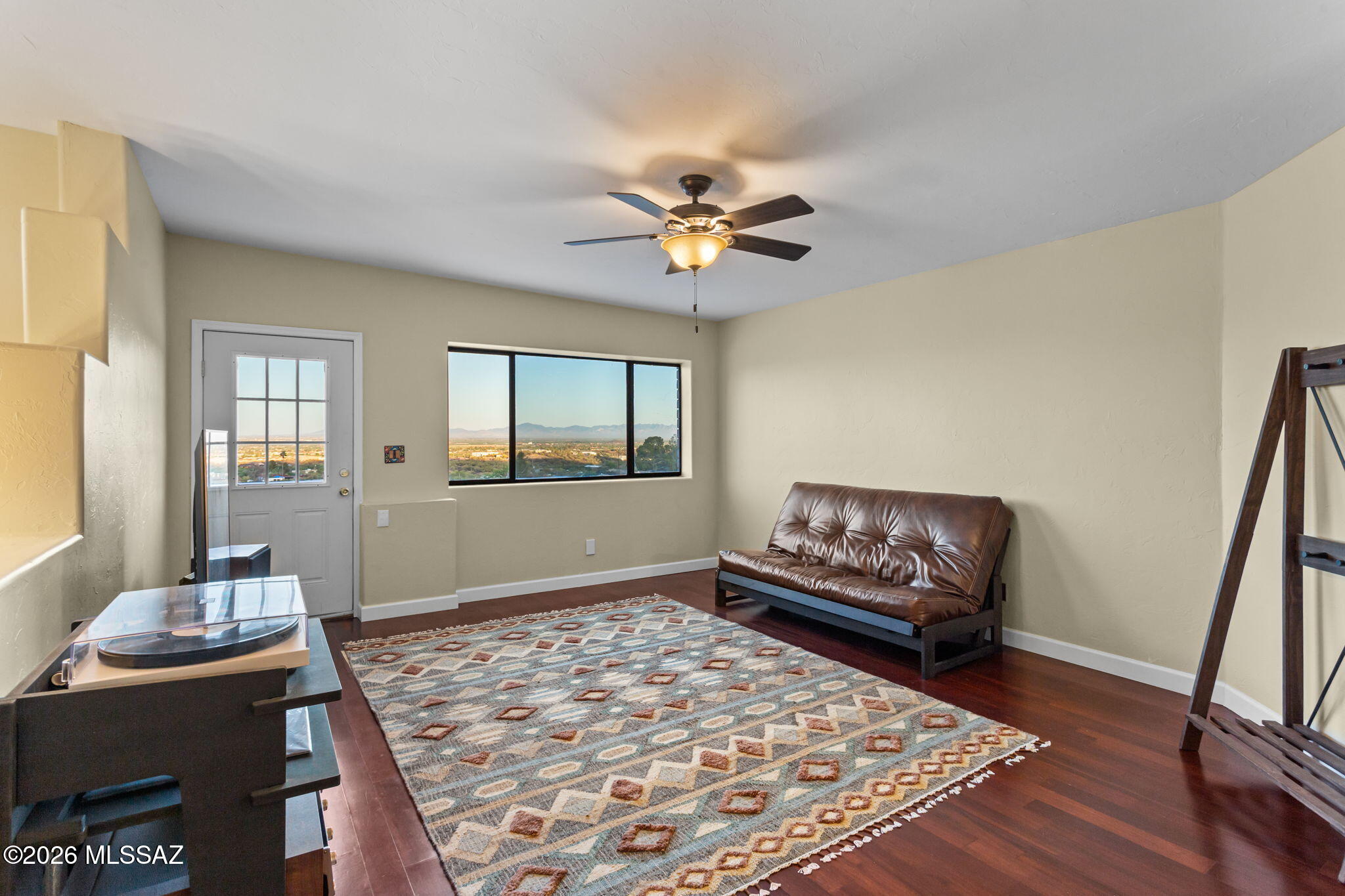 4210 West Mossman Road Tucson, AZ 85746 - Photo 16 of 51 a living room with furniture and a rug