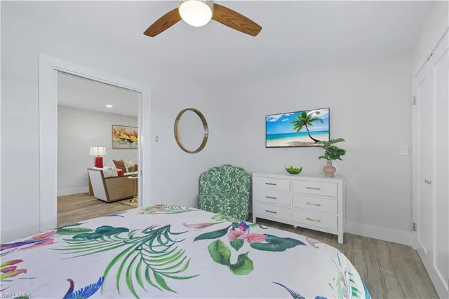 a bedroom with a bed and a dresser