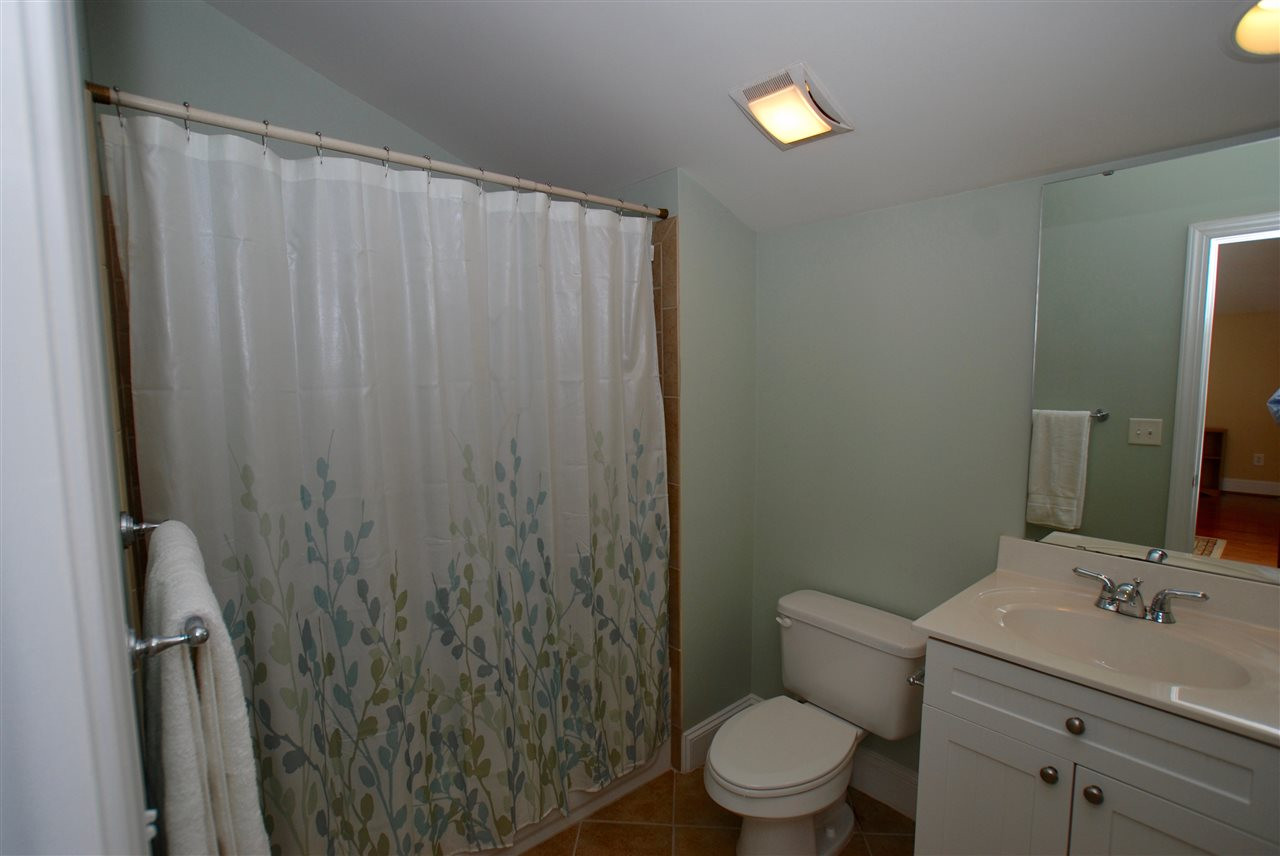 1228 North Blount Street Raleigh, NC 27604 - Photo 12 of 25 Main level full bathroom offers great flexibility for the now or down the road. Bathroom