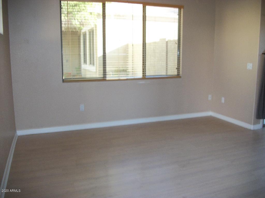 21817 North 40th Place Phoenix, AZ 85050 - Photo 13 of 25 an empty room with a window
