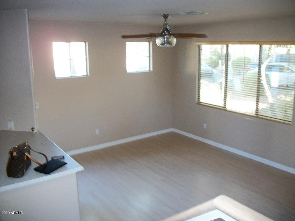 21817 North 40th Place Phoenix, AZ 85050 - Photo 16 of 25 a view of a room that has a window in it