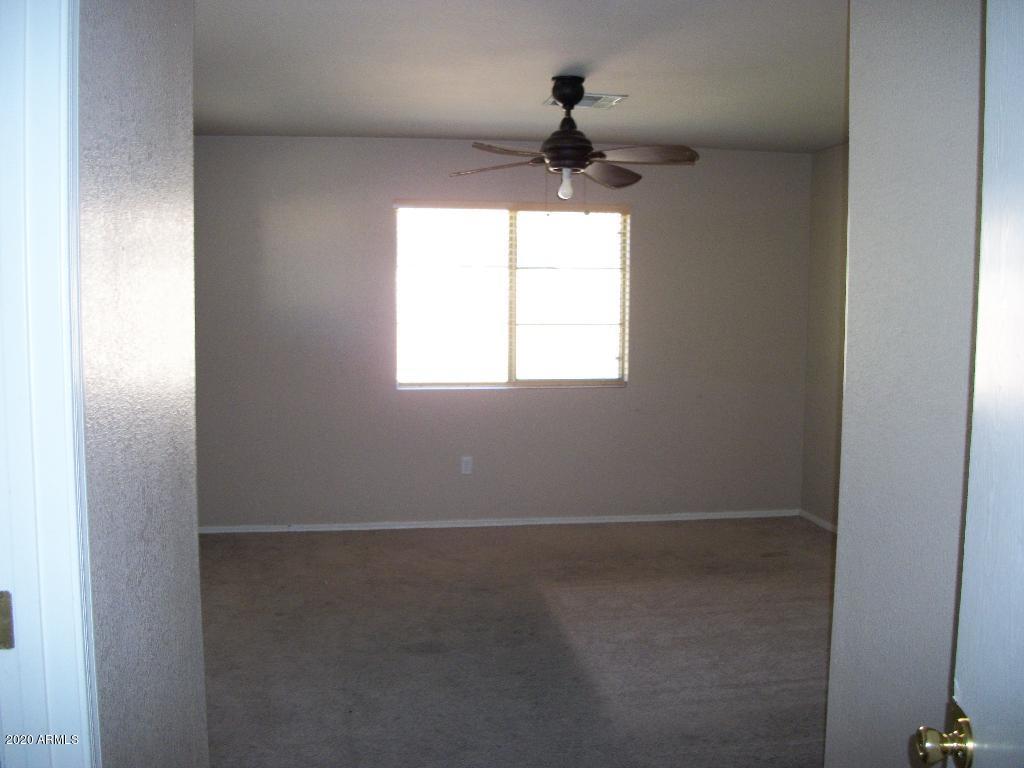 21817 North 40th Place Phoenix, AZ 85050 - Photo 18 of 25 a view of an empty room and a window