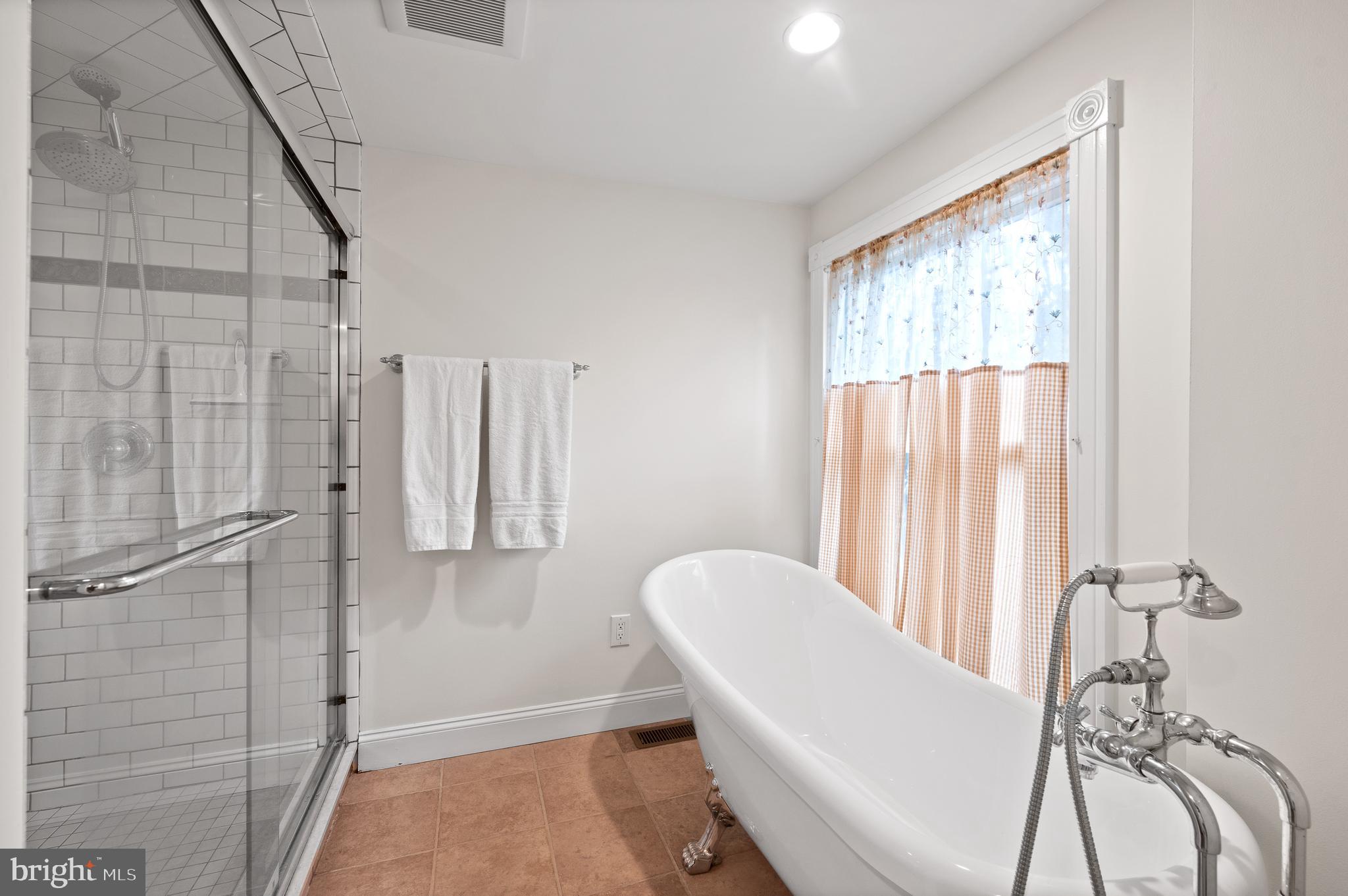 425 Chestnut Lane Wayne, PA 19087 - Photo 37 of 59 Soaking tub + shower with multiple shower heads