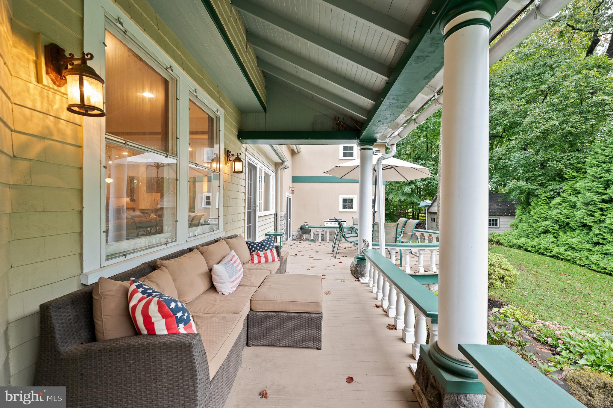 425 Chestnut Lane Wayne, PA 19087 - Photo 54 of 59 Covered rear porch has multiple seating areas