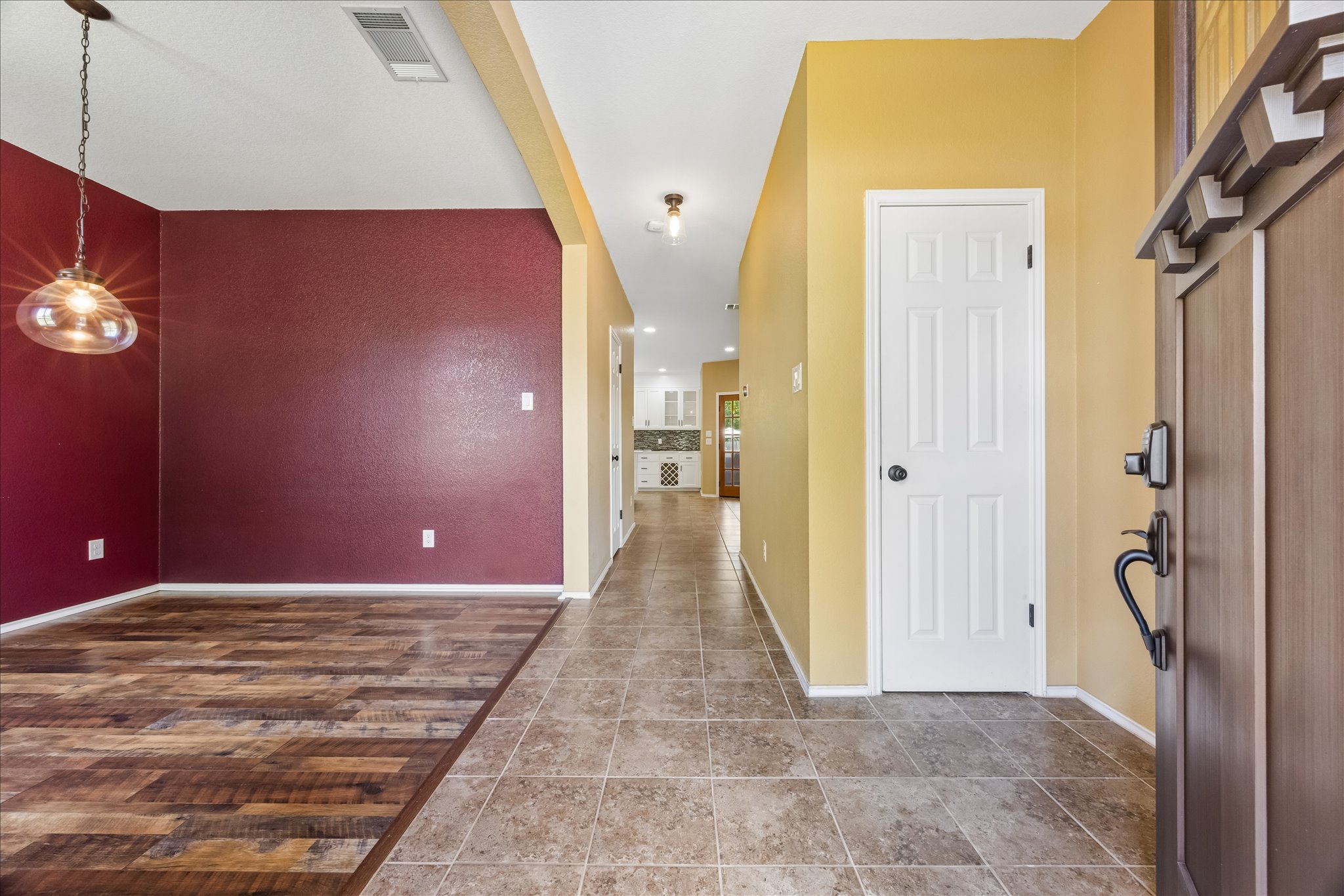 338 Spring Branch Loop Kyle, TX 78640 - Photo 3 of 36 Enter into a versatile space featuring durable flooring and an inviting color palette.