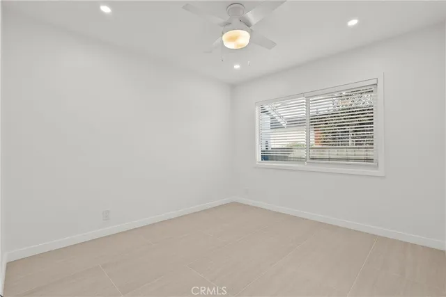 a bathroom with a sink a mirror and a shower