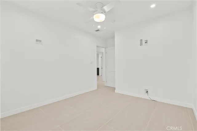 a bathroom with a sink a mirror and a shower