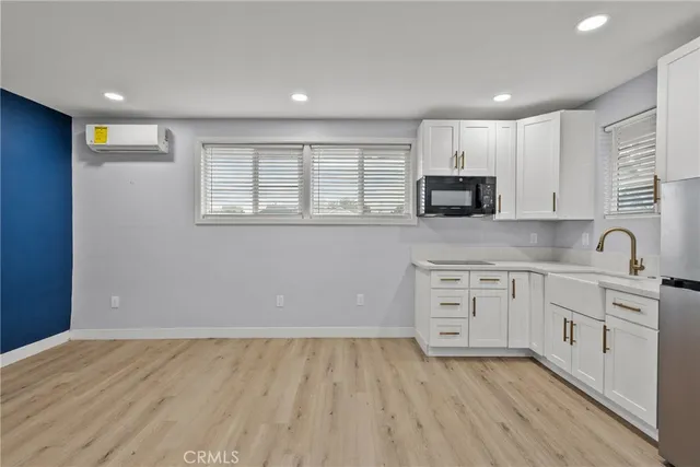 an aerial view of a house with a swimming pool