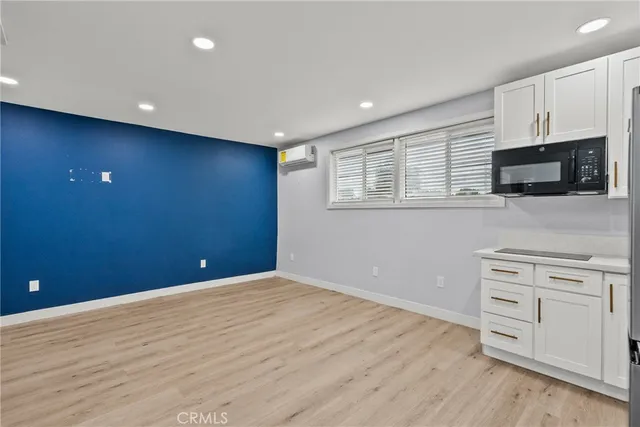 a view of a wooden door with a swimming pool