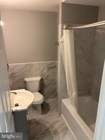 a kitchen with stainless steel appliances a refrigerator and a stove