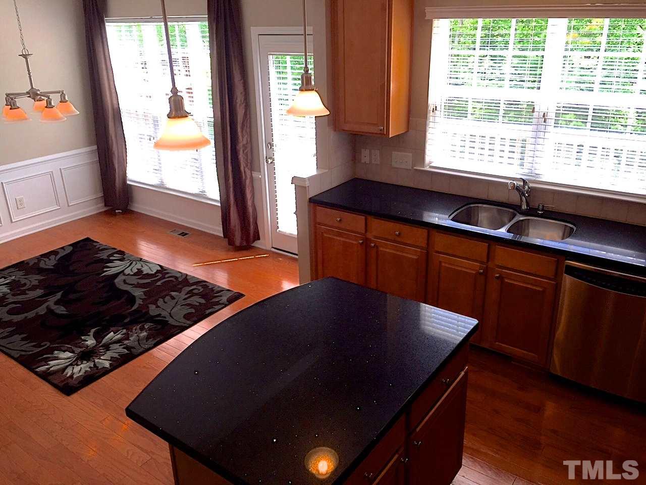 2742 Laurel Cherry Street Raleigh, NC 27612 - Photo 25 of 25 The kitchen opens to the Dining Room. A great floor plan for entertaining and mingling.