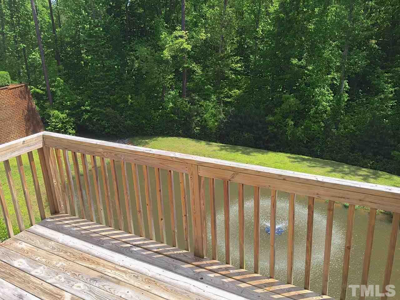 2742 Laurel Cherry Street Raleigh, NC 27612 - Photo 22 of 25 Overlooking the pond with fountain. You're in the city but you wouldn't know it from this vantage point.
