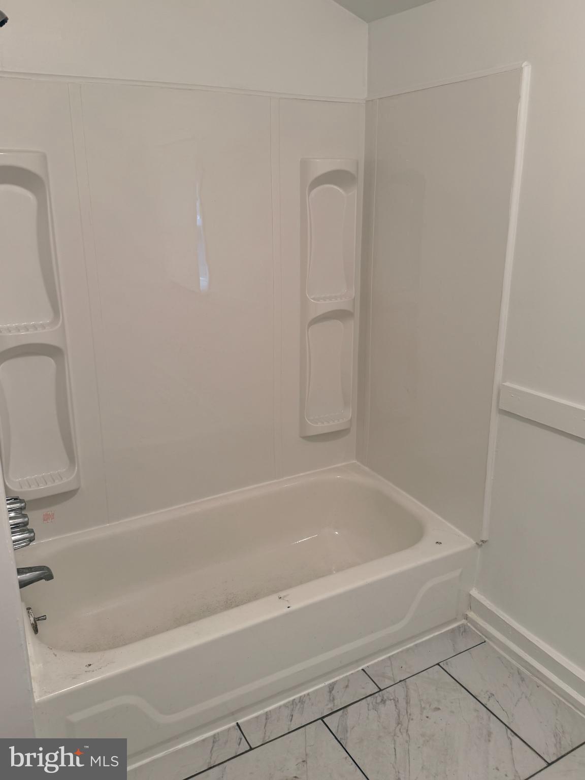 176 Griffith Street Salem, NJ 08079 - Photo 12 of 34 Modern bathroom with sleek tub design.