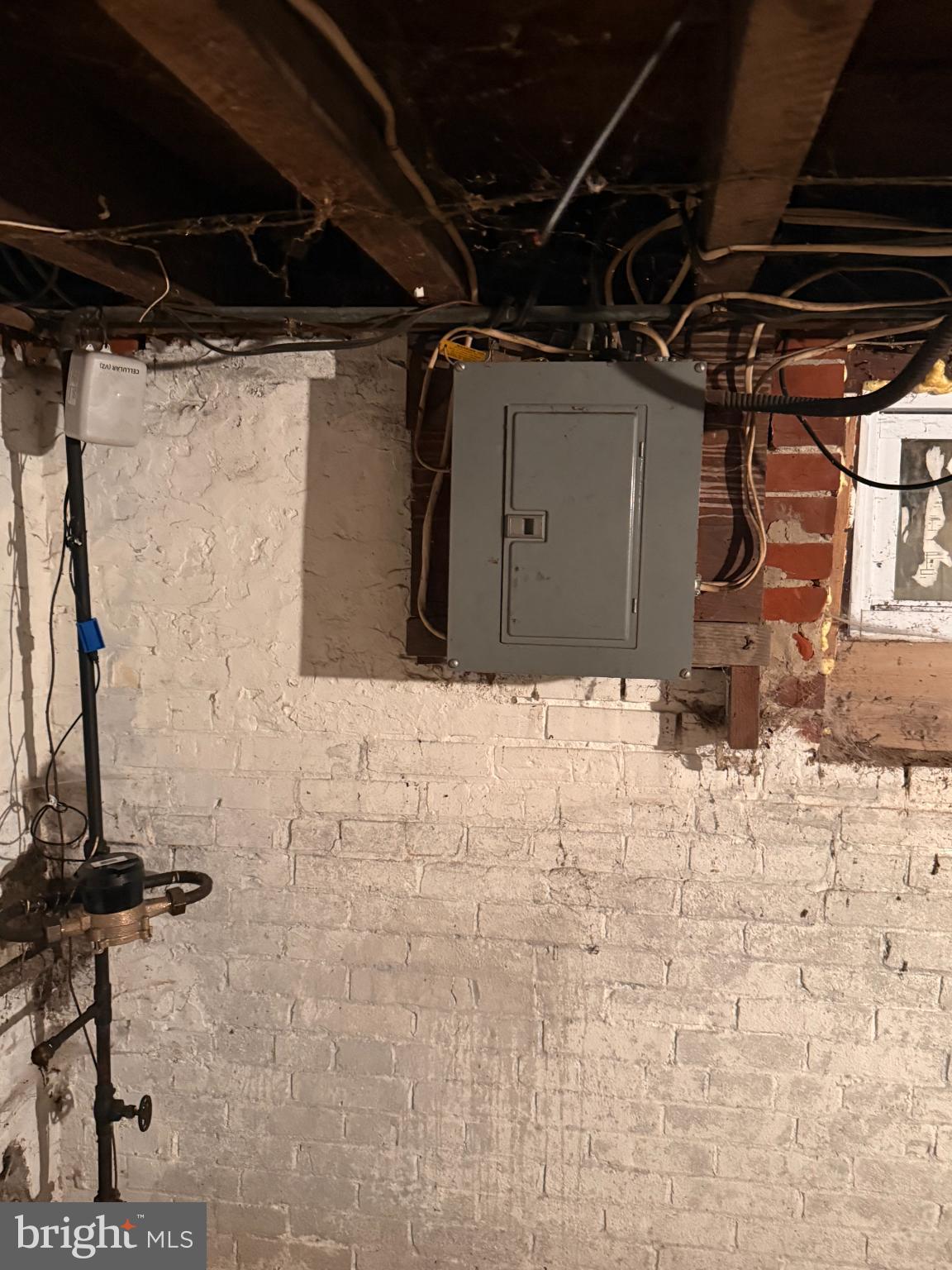 176 Griffith Street Salem, NJ 08079 - Photo 32 of 34 Basement with exposed wiring and panel box.