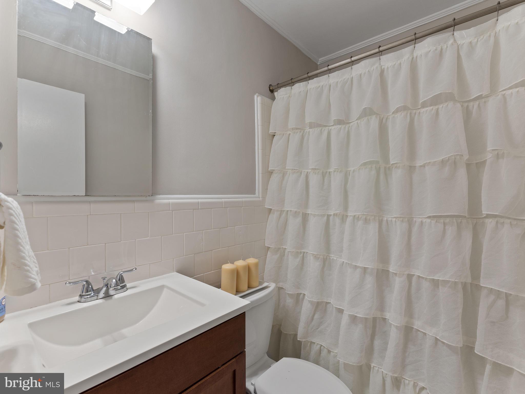 8722 Manchester Road, Unit 8 Silver Spring, MD 20901 - Photo 17 of 23 Renovated bathroom