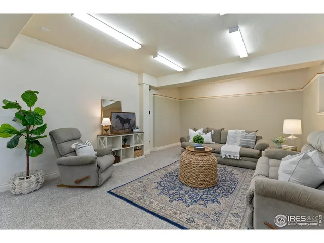 a living room with furniture and a couch