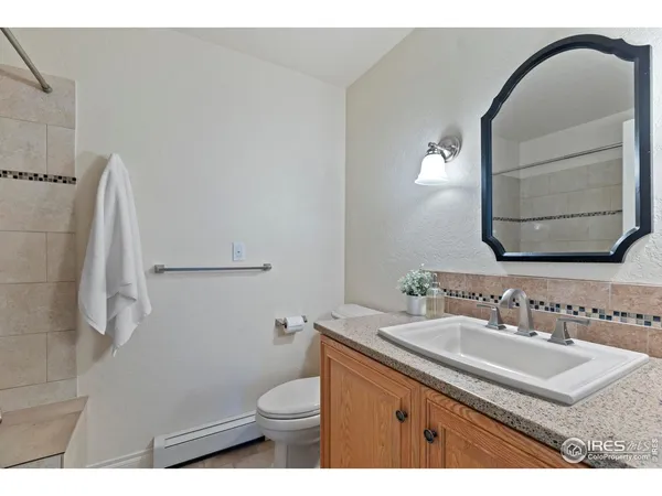 a view of a backyard with pathway