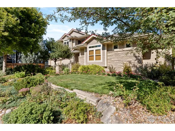 an aerial view of a house with a garden