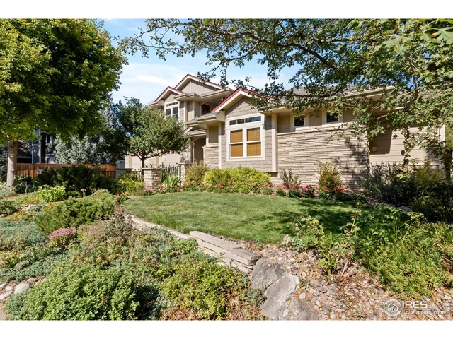 an aerial view of a house with a garden
